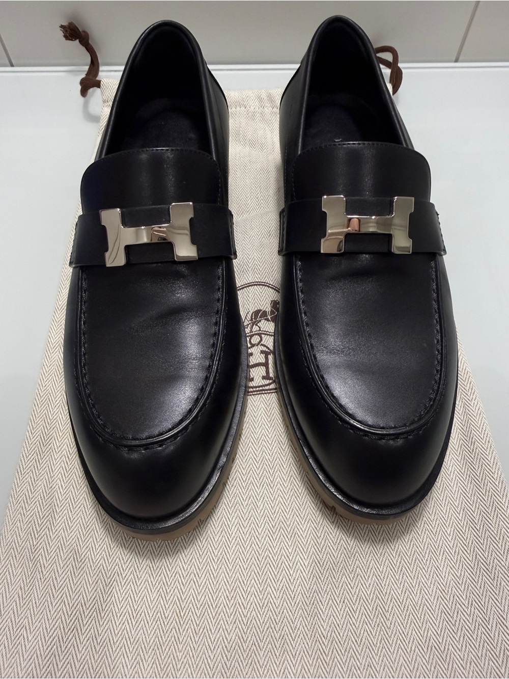 Hermes Black Leather Loafers with Metallic Constance “H”